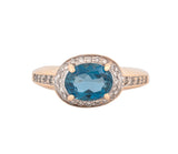 14K Yellow Gold London Blue Topaz and Diamond East-West Set Halo Style Ring