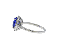 Platinum Tanzanite and Diamond Halo Style Ring