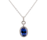 18K White Gold 4.81ct. Tanzanite & .35 cttw. Diamond Halo Style Pendant Necklace