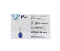 18K White Gold 4.81ct. Tanzanite & .35 cttw. Diamond Halo Style Pendant Necklace